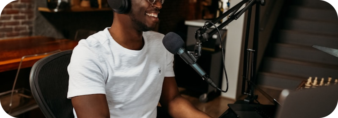 an image of a man smiling and creating video content